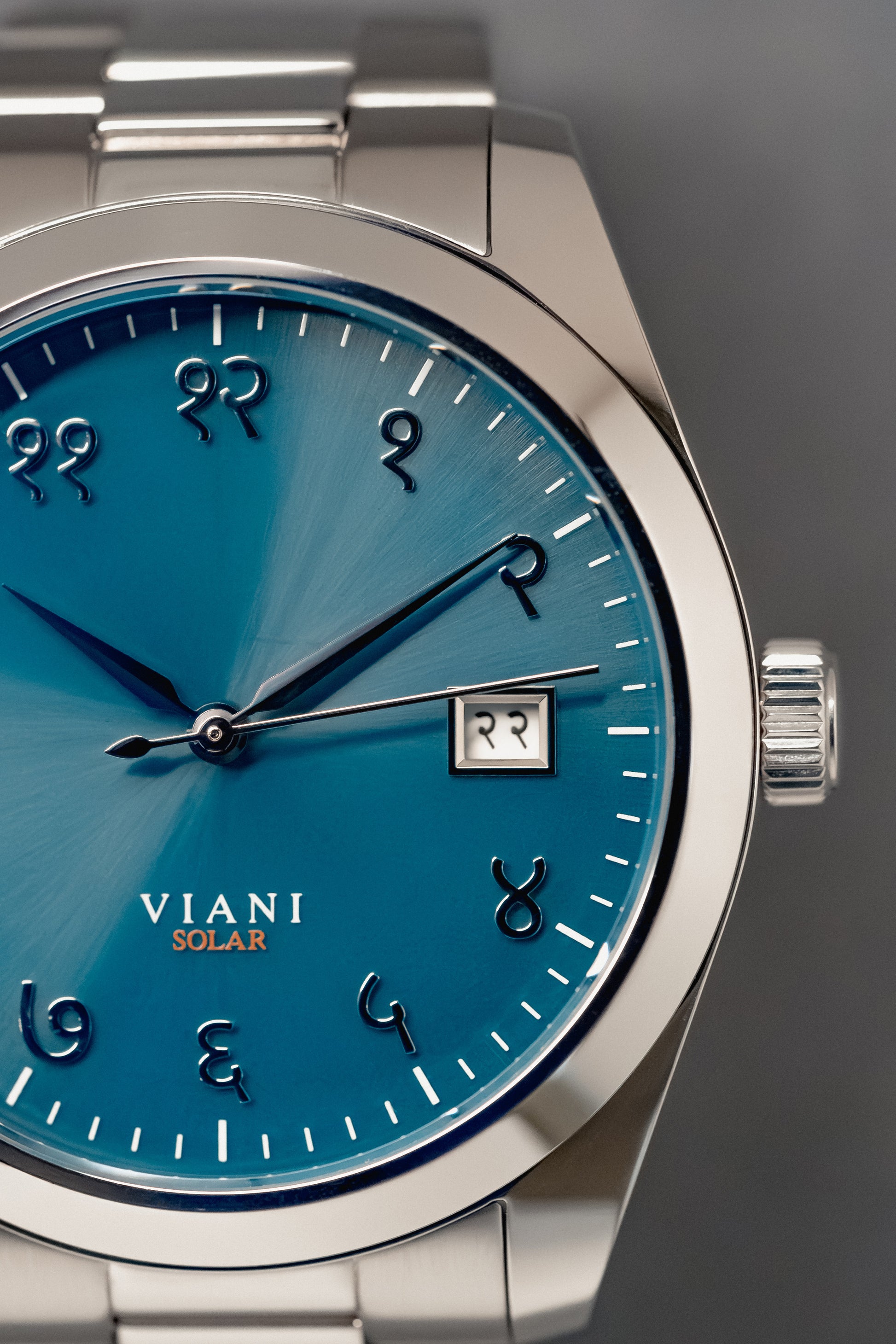 VIANI Watch Company Hindi Numeral, Waterfall Blue Dial Face with Sunray Effect, Silver Hour Minute and Second Hands, Hindi Numeral Date Wheel, Solar Movement, PVD Stainless Steel Strap